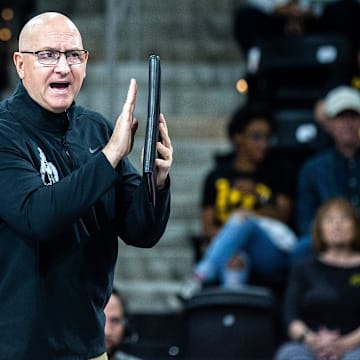 Purdue head coach Dave Shondell calls out instructions 