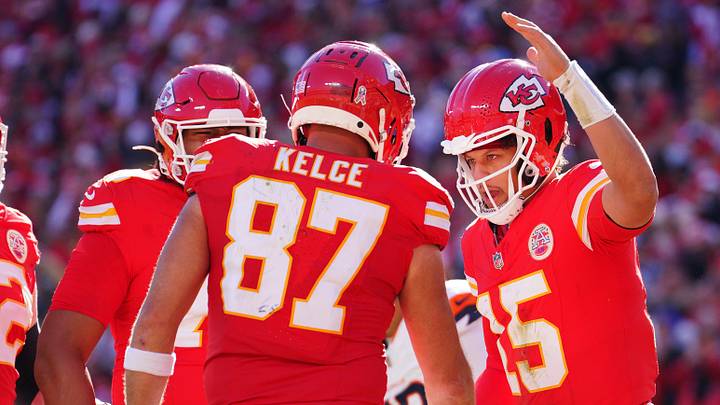 Kansas City Chiefs tight end Travis Kelce (87) celebrates with quarterback Patrick Mahomes (15)