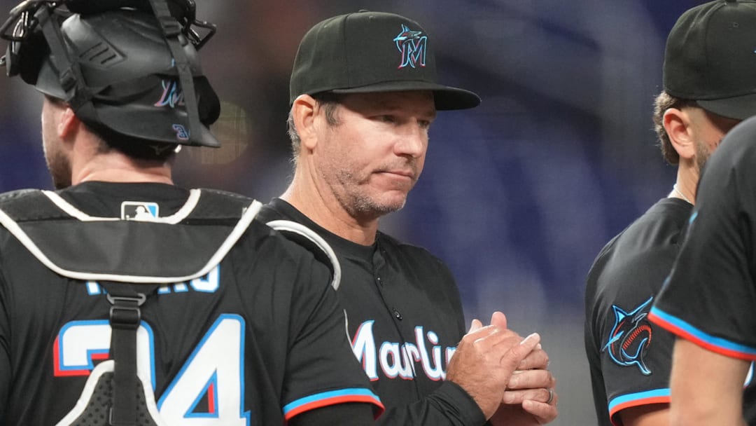 May 2, 2025; Miami, Florida, USA;  Miami Marlins manager Clayton McCullough (86) makes a pitching change in the fifth inning during the game against the Oakland Athletics at loanDepot Park. Mandatory Credit: Jim Rassol-Imagn Images