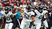 Nov 9, 2025; Houston, Texas, USA; Jacksonville Jaguars defensive end Danny Striggow (92) reacts to his fumble recovery against the Houston Texans in the first half  at NRG Stadium. Mandatory Credit: Thomas Shea-Imagn Images