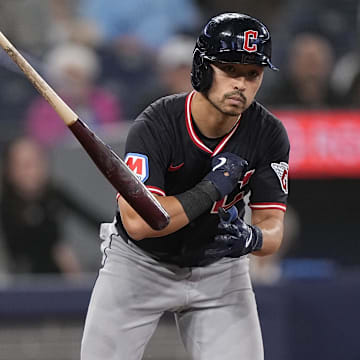 May 4, 2025; Toronto, Ontario, CAN; Cleveland Guardians left fielder Steven Kwan (38) tosses his bat as he is walked during the ninth inning against the Toronto Blue Jays at Rogers Centre. Mandatory Credit: John E. Sokolowski-Imagn Images