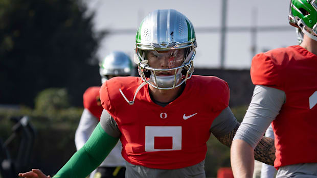 Oregon quarterback Dillon Gabriel works out during open practice for the Oregon Ducks at the Dignity Health Sports Park in Ca