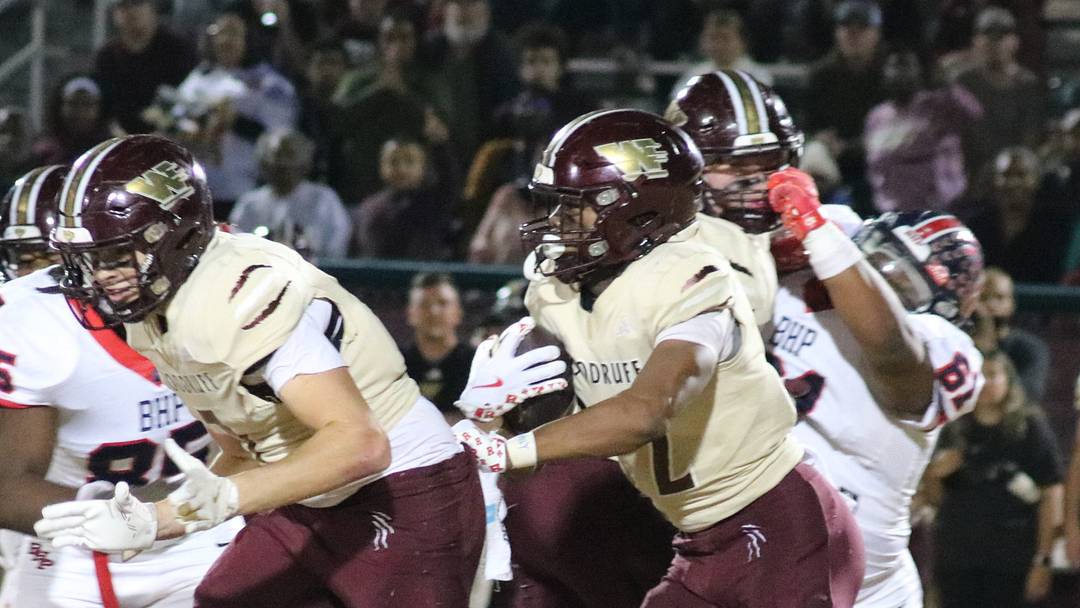 Woodruff's Aiden Gibson looks for yardage Nov. 21 in the playoffs game against Belton-Honea Path.