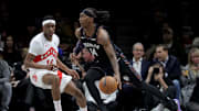 Nov 11, 2025; Brooklyn, New York, USA; Brooklyn Nets guard Terance Mann (14) controls the ball against Toronto Raptors guard Ja'Kobe Walter (14) during the second quarter at Barclays Center. Mandatory Credit: Brad Penner-Imagn Images
