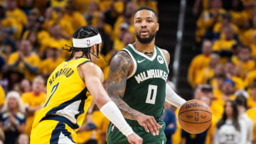 Apr 26, 2024; Indianapolis, Indiana, USA; Milwaukee Bucks guard Damian Lillard (0) dribbles the ball