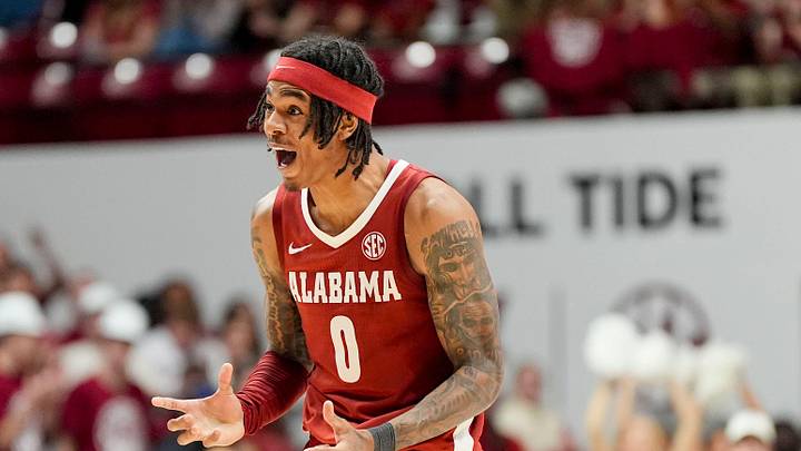Dec 3, 2025; Tuscaloosa, AL, USA; Alabama guard Labaron Philon Jr. (0) celebrates after making a three pointer against Clemson at Coleman Coliseum. Alabama defeated Clemson 90-84 and Philon scored 29. Mandatory Credit: Gary Cosby Jr.-Tuscaloosa News
