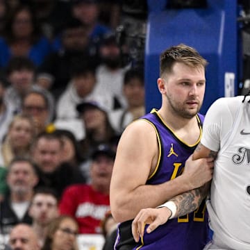 Apr 9, 2025; Dallas, Texas, USA; Los Angeles Lakers guard Luka Doncic (77) and Dallas Mavericks forward Anthony Davis (3) in action during the game between the Dallas Mavericks and the Los Angeles Lakers at American Airlines Center. Mandatory Credit: Jerome Miron-Imagn Images