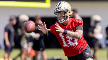 May 11, 2024; New Orleans, LA, USA;  New Orleans Saints quarterback Spencer Rattler (18) runs passing drills during the rookie minicamp at the Ochsner Sports Performance Center. Mandatory Credit: Stephen Lew-USA TODAY Sports