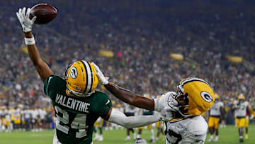 Green Bay Packers cornerback Carrington Valentine (24) breaks up a pass intended for wide receiver Romeo Doubs (87) during Family Night on Saturday, August 2, 2025, at Lambeau Field in Green Bay, Wis. 
Tork Mason/USA TODAY NETWORK-Wisconsin