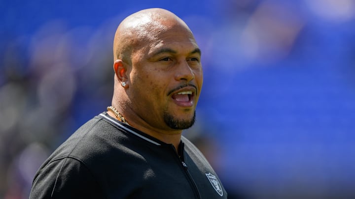 Las Vegas Raiders coach Antonio Pierce stands on the sidelines.