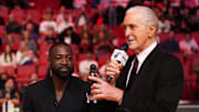Jan 14, 2024; Miami, Florida, USA; Miami Heat president Pat Riley (R) shows former player Dwayne Wade (L) a bobble head while announcing that a statue in the likeness of Wade will be erected outside the arena in 2025, during halftime of the game between the Miami Heat and the Charlotte Hornets at Kaseya Center. Mandatory Credit: Jasen Vinlove-Imagn Images