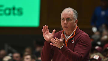 Dec 31, 2024; Durham, North Carolina, USA; Virginia Tech Hokies head coach Mike Young encourages his team during the first half against the Duke Blue Devils at Cameron Indoor Stadium. Mandatory Credit: Rob Kinnan-Imagn Images