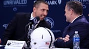 Matt Campbell, left, speaks with Penn State University athletic director Pat Kraft while being announced as the Penn State Nittany Lions new head coach during a press conference at Beaver Stadium.