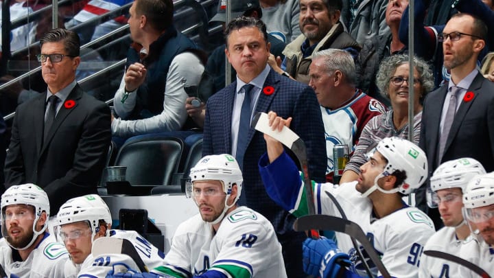 Nov 11, 2021; Denver, Colorado, USA; Vancouver Canucks head coach Travis Green looks on from the bench in the third period against the Colorado Avalanche at Ball Arena. Mandatory Credit: Isaiah J. Downing-USA TODAY Sports