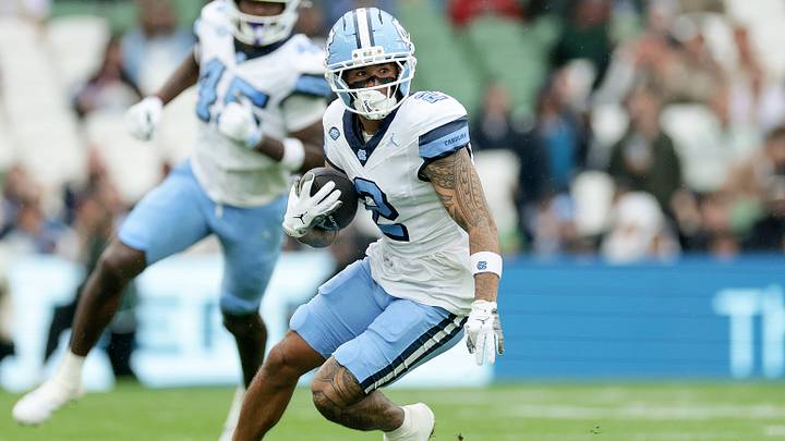 Aug 29, 2026; Dublin, Co. Dublin, IRL; North Carolina Tar Heels wide receiver Trech Kekahuna (2) carries the ball against the TCU Horned Frogs in the first half at Aviva Stadium. Mandatory Credit: Laszlo Geczo-Imagn Images