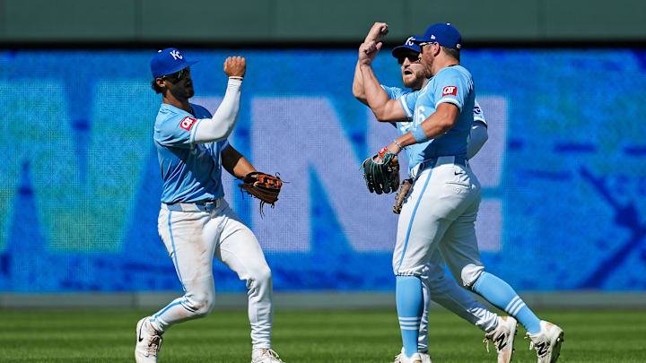 Sep 8, 2024; Kansas City, Missouri, USA; Kansas City Royals left fielder MJ Melendez (1) and center fielder Kyle Isbel (28) and right fielder Hunter Renfroe (16) celebrate after defeating the Minnesota Twins at Kauffman Stadium. Mandatory Credit: Jay Biggerstaff-Imagn Images