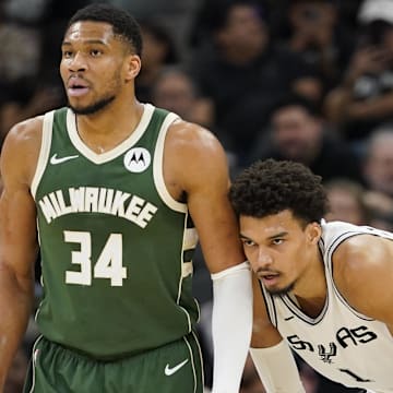 Jan 31, 2025; San Antonio, Texas, USA; Milwaukee Bucks forward Giannis Antetokounmpo (34) and San Antonio Spurs center Victor Wembanyama (1) during the first half at Frost Bank Center. Mandatory Credit: Scott Wachter-Imagn Images