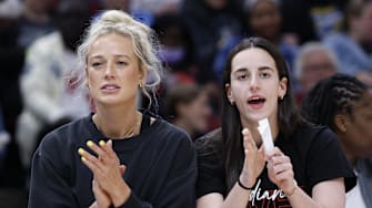 Jun 7, 2025; Chicago, Illinois, USA; Injured Indiana Fever guard Sophie Cunningham (8) and guard Caitlin Clark (22) react from the bench during the first half of a WNBA game against the Chicago Sky at United Center. Mandatory Credit: Kamil Krzaczynski-Imagn Images