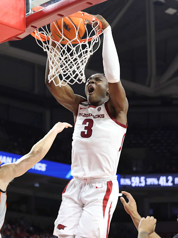 Adou Thiero dunks the ball for the Arizona Razorbacks. 
