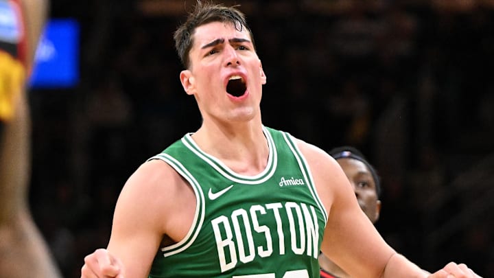 Jan 28, 2026; Boston, Massachusetts, USA; Boston Celtics center Luka Garza (52) reacts after missing a basket against the Atlanta Hawks during the second half at the TD Garden. Mandatory Credit: Brian Fluharty-Imagn Images
