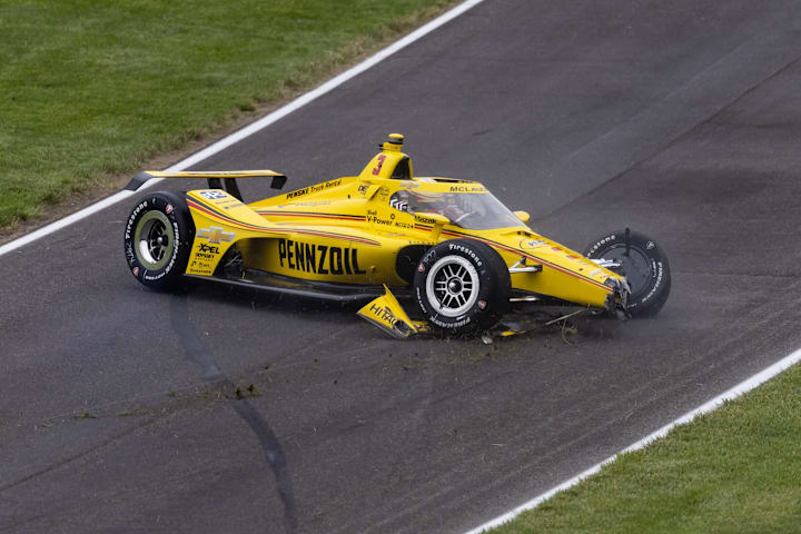 IndyCar Series driver Scott McLaughlin crashes on the pace lap of the 109th Running of the Indianapolis 500.