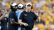 Houston Cougars head coach Willie Fritz (right) and wide receivers coach Derrick Sherman against the Arizona State Sun Devils at Mountain America Stadium. 