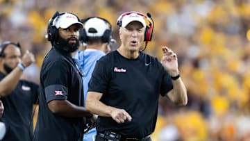 Houston Cougars head coach Willie Fritz (right) and wide receivers coach Derrick Sherman against the Arizona State Sun Devils at Mountain America Stadium. 