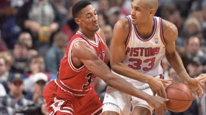 Feb 15, 1996;  Auburn Hills MI, USA; FILE PHOTO; Chicago Bulls forward Scottie Pippen (33) guards against Detroit Pistons forward Grant Hill (33) at the Palace at  Auburn Hills. The Bulls beat the Pistons 112-109 in overtime. Mandatory Credit: Matthew Emmons-USA TODAY Sports