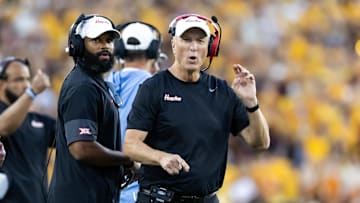 Houston Cougars head coach Willie Fritz (right) and wide receivers coach Derrick Sherman against the Arizona State Sun Devils at Mountain America Stadium.