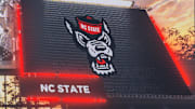 Oct 11, 2025; South Bend, Indiana, USA; Notre Dame Fighting Irish and NC State Wolfpack logos on the scoreboard before the matchup at Notre Dame Stadium. Mandatory Credit: Michael Caterina-Imagn Images
