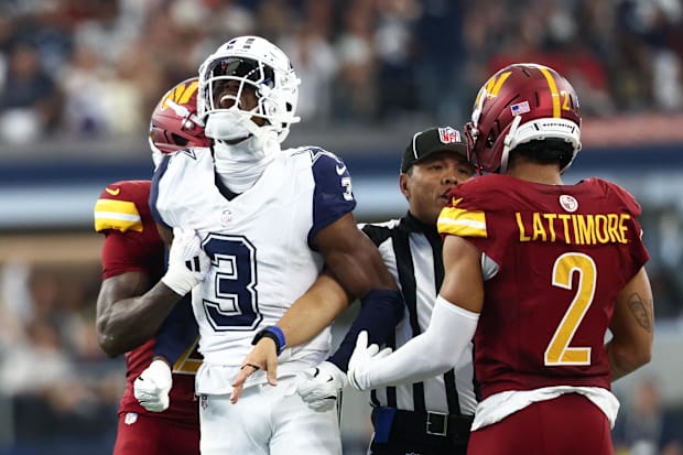 Dallas Cowboys wide receiver George Pickens celebrates after a play