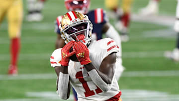 Oct 25, 2020; Foxborough, Massachusetts, USA; San Francisco 49ers wide receiver Brandon Aiyuk (11) makes a catch on a pass from quarterback Jimmy Garoppolo (not seen) during the second half against the New England Patriots at Gillette Stadium. Mandatory Credit: Brian Fluharty-USA TODAY Sports