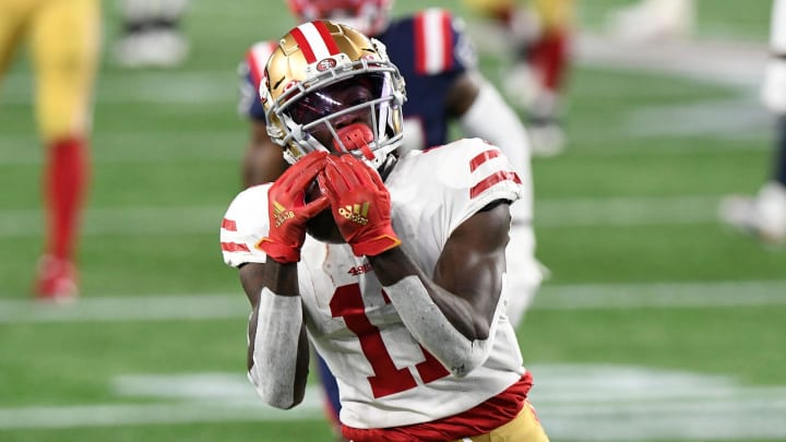 Oct 25, 2020; Foxborough, Massachusetts, USA; San Francisco 49ers wide receiver Brandon Aiyuk (11) makes a catch on a pass from quarterback Jimmy Garoppolo (not seen) during the second half against the New England Patriots at Gillette Stadium. Mandatory Credit: Brian Fluharty-USA TODAY Sports