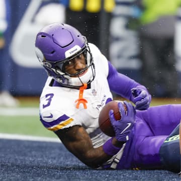 Dec 22, 2024; Seattle, Washington, USA; Minnesota Vikings wide receiver Jordan Addison (3) looks up after catching a touchdown pass in the end zone against the Seattle Seahawks during the first quarter at Lumen Field. Mandatory Credit: Joe Nicholson-Imagn Images