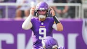 Minnesota Vikings quarterback J.J. McCarthy under center against the Las Vegas Raiders in the third quarter at U.S. Bank Stadium in Minneapolis on Aug. 10, 2024.