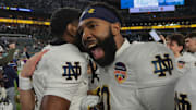 Jan 9, 2025; Miami, FL, USA; Notre Dame Fighting Irish wide receiver Deion Colzie (0) celebrates after defeating the Penn State Nittany Lions in the Orange Bowl at Hard Rock Stadium. 