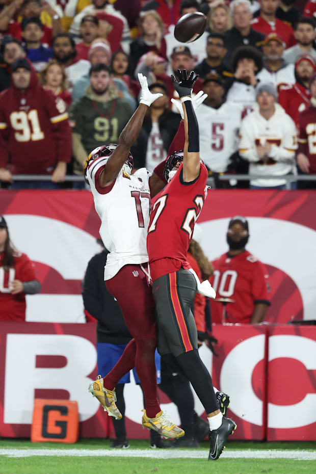 Tampa Bay Buccaneers cornerback Zyon McCollum breaks up a pass for Washington Commanders wide receiver Terry McLauri