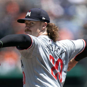 Minnesota Twins starting pitcher Chris Paddack (20) delivers a pitch against the San Francisco Giants during the first inning at Oracle Park in San Francisco on July 14, 2024.