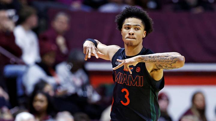 Jan 4, 2025; Blacksburg, Virginia, USA; Miami Hurricanes guard Jalil Bethea (3) celebrates after making a three pointer during the first half against the Virginia Tech Hokies at Cassell Coliseum. Mandatory Credit: Peter Casey-Imagn Images