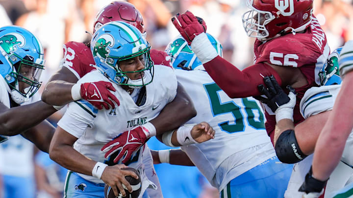 Oklahoma Sooners defensive lineman R Mason Thomas (32) sacks Tulane Green Wave quarterback Darian Mensah (10) during a college football game between the University of Oklahoma Sooners (OU) and the Tulane Green Wave at Gaylord Family - Oklahoma Memorial Stadium in Norman, Okla., Saturday, Sept. 14, 2024.