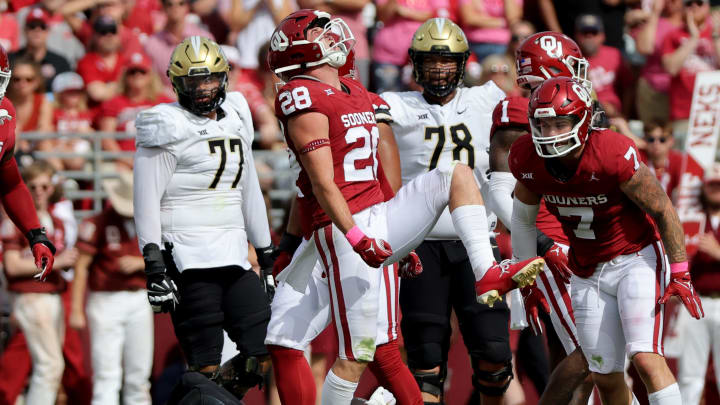 Oklahoma's Danny Stutsman (28) celebrates a play in the first half of the college football game between the University of Oklahoma Sooners and the University of Central Florida Knights at Gaylord Family Oklahoma-Memorial Stadium in Norman, Okla., Saturday, Oct., 21, 2023.