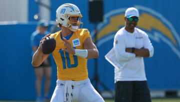 Jul 24, 2024; El Segundo, CA, USA;  Los Angeles Chargers quarterback Justin Herbert (10) throws during the first day of training camp at The Bolt.