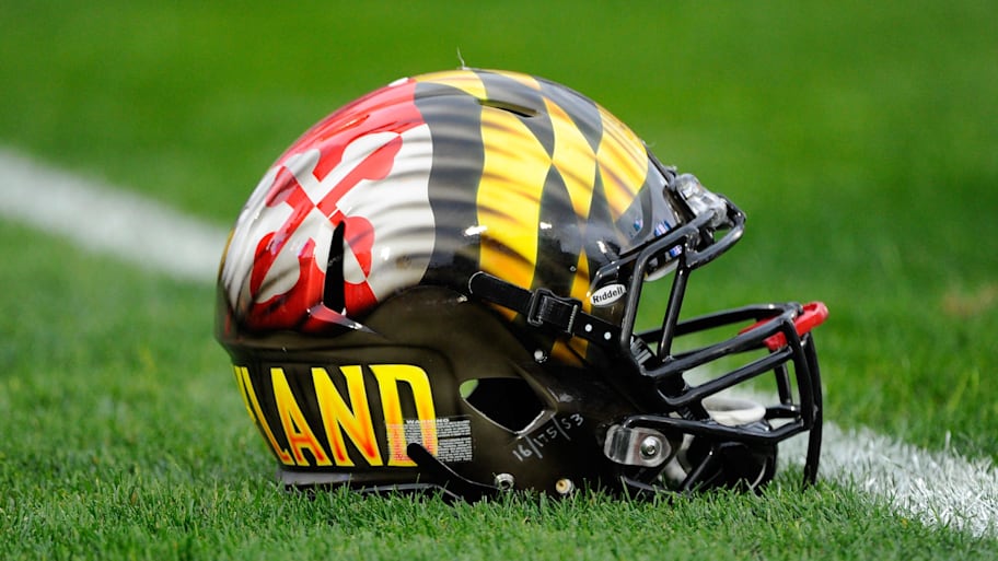 A Maryland football helmet sits on a field in 2014. | Rich Barnes-Imagn Images