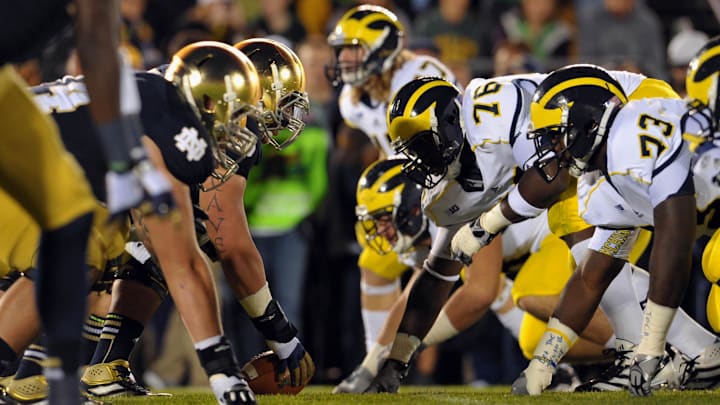 Sep 22, 2012; South Bend, IN, USA; The Notre Dame Fighting Irish and the Michigan Wolverines line up at the line of scrimmage in the third quarter at Notre Dame Stadium. Notre Dame won 13-6. Sep 22, 2012; South Bend, IN, USA; The Notre Dame Fighting Irish and the Michigan Wolverines line up at the line of scrimmage in the third quarter at Notre Dame Stadium. Notre Dame won 13-6.