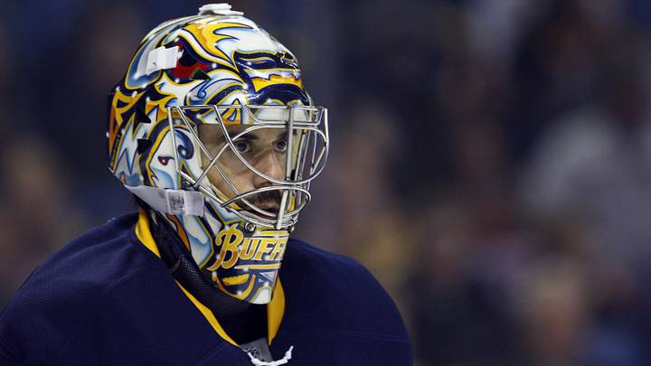 Feb 25, 2014; Buffalo, NY, USA; Buffalo Sabres goalie Ryan Miller (30) during a stoppage in play against the Carolina Hurricanes during the first period at First Niagara Center. Mandatory Credit: Timothy T. Ludwig-Imagn Images