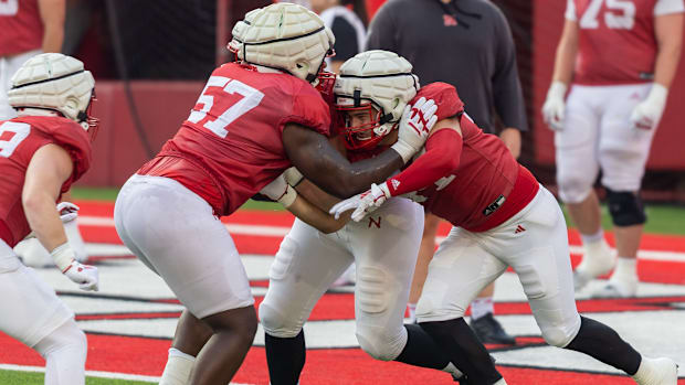 Nebraska offensive lineman Elijah Pritchett battles a double team from Brock Knutson and Luke Lindenmeyer.