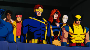 (L-R): Beast (voiced by George Buza), Roberto Da Costa (voiced by Gui Agustini), Jubilee (voiced by Holly Chou), Cyclops (voiced by Ray Chase), Jean Grey (voiced by Jennifer Hale), Morph (voiced by JP Karliak), and Wolverine (voiced by Cal Dodd) in Marvel Animation's X-MEN '97. Photo courtesy of Marvel Animation. © 2024 MARVEL.