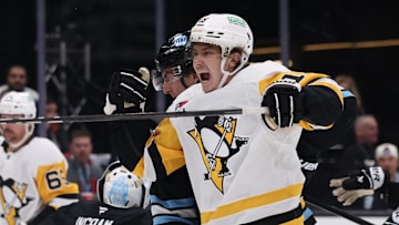 Jan 29, 2025; Salt Lake City, Utah, USA; Pittsburgh Penguins center Cody Glass reacts to a goal against the Utah Hockey Club by defenseman Erik Karlsson (not shown) during the third period at Delta Center. Mandatory Credit: Rob Gray-Imagn Images