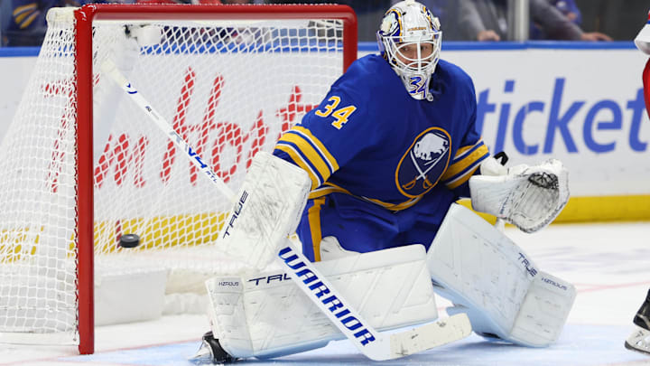 Oct 9, 2025; Buffalo, New York, USA;  Buffalo Sabres goaltender Alex Lyon (34) looks to make a save during the second period against the New York Rangers at KeyBank Center. Mandatory Credit: Timothy T. Ludwig-Imagn Images