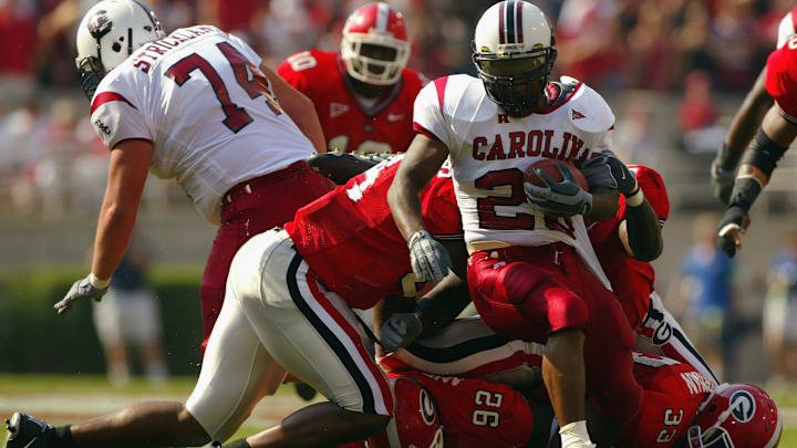 Daccus Turman runs the ball